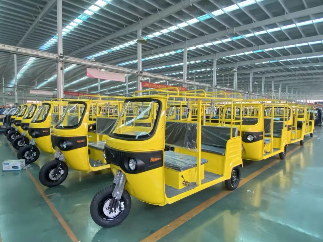 Bulk Keke Napep shipment prepared in a Chinese factory for export to Nigeria